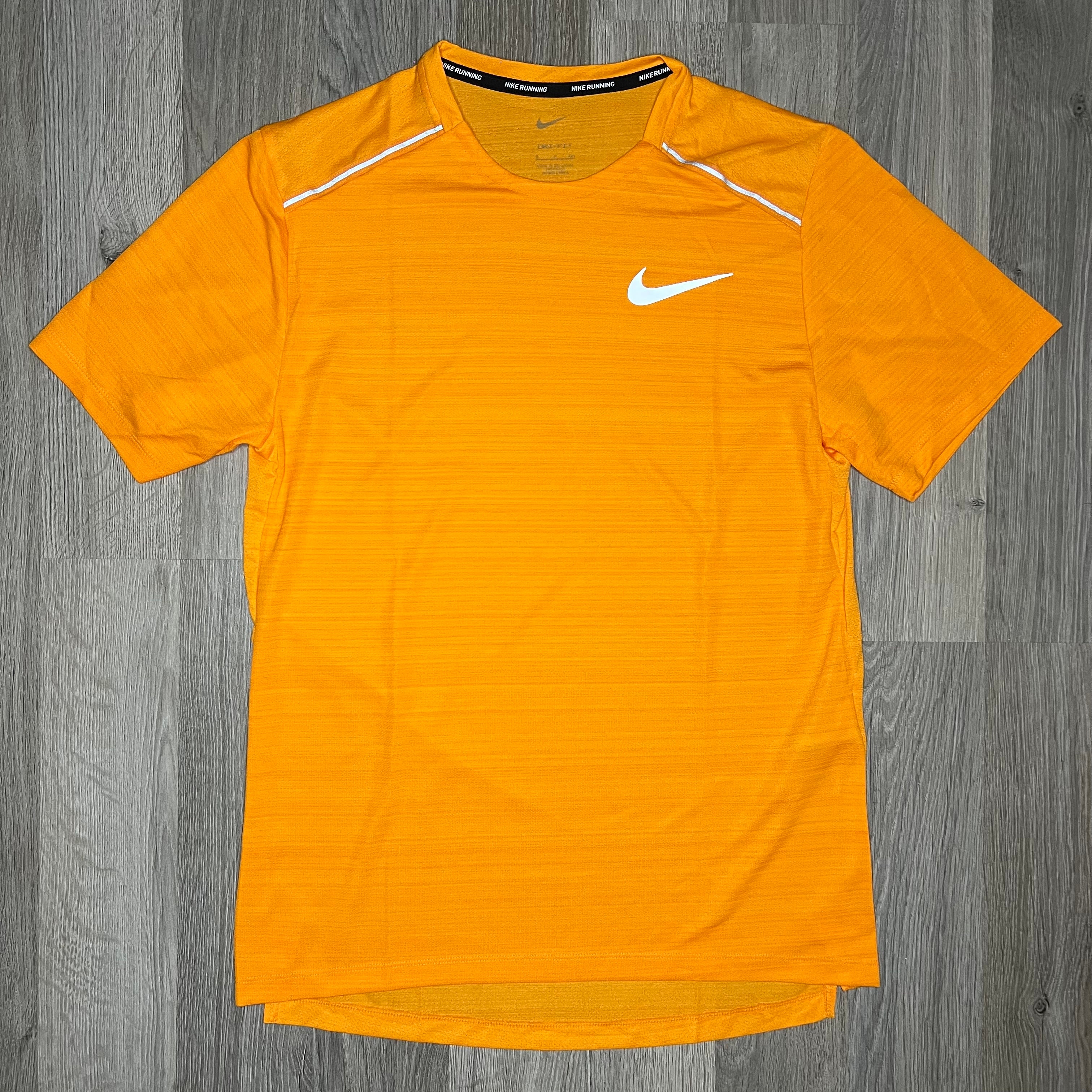 Orange and purple hot sale nike shirt