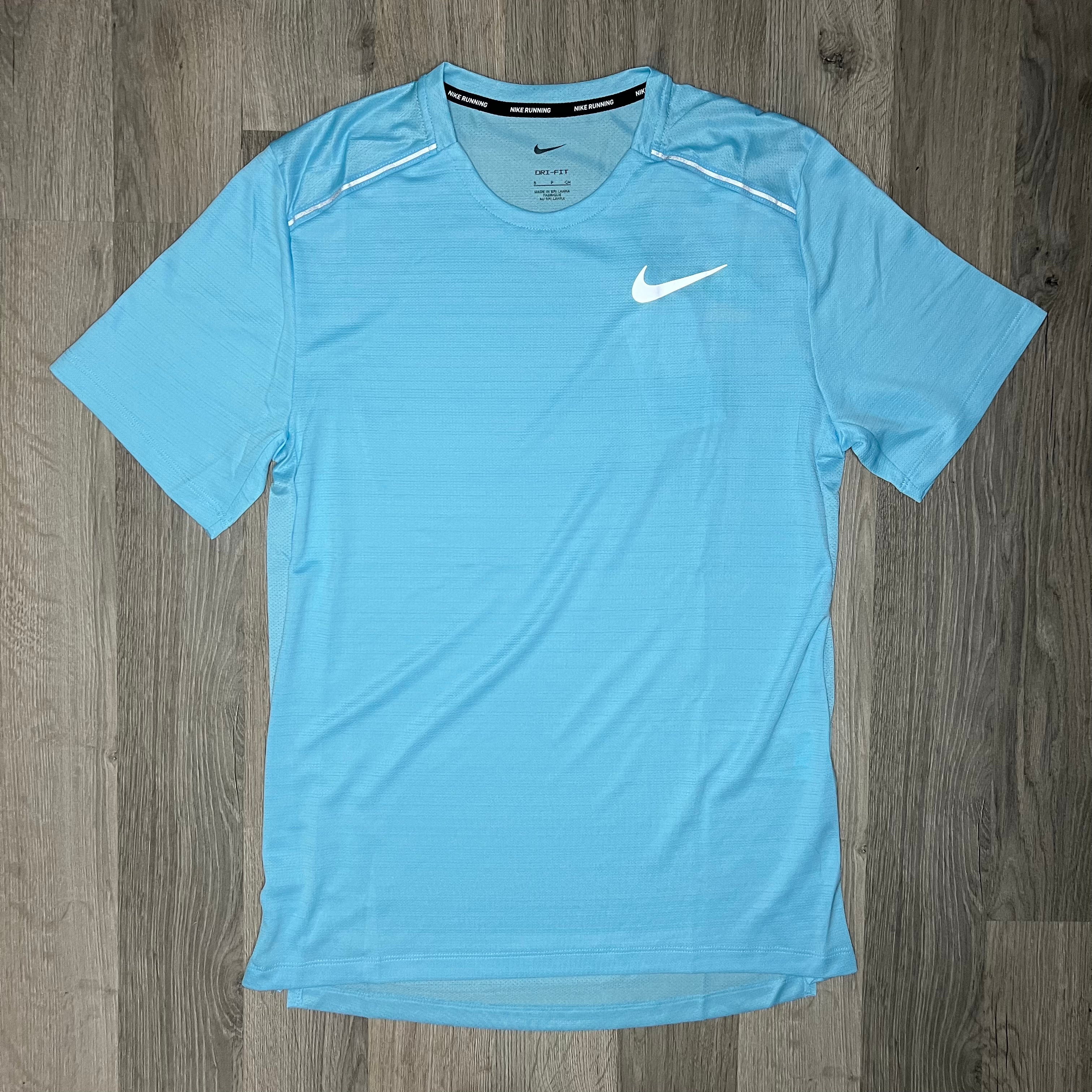 purple and aqua nike shirt